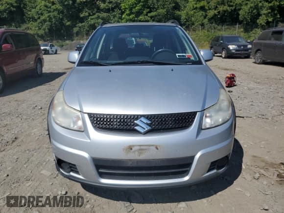 ✅ 2010 Suzuki SX4 • VIN: JS2YB5A32A6302073 • Лот: 75639124. Опубликован ранее на Copart с пробегом 104 816 миль. Бесплатный доступ к архиву аукционных продаж из США и подробный отчёт об истории автомобиля на DreamBid. Изображение 5.