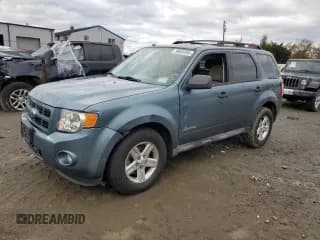✅ 2011 Ford Escape Hybrid • VIN: 1FMCU5K33BKC01187 • Lot: 90885095. Wystawiony na Copart z przebiegiem 316 896 mil. Bezpłatny archiwum sprzedaży aukcyjnych z USA i szczegółowy raport historii pojazdu na DreamBid. Zdjęcie 1.