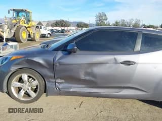 ✅ 2012 Hyundai Veloster w/Gray Int • VIN: KMHTC6AD9CU074924 • Lot: 41372570. Wystawiony na IAAI z przebiegiem 67 291 mil. Bezpłatny archiwum sprzedaży aukcyjnych z USA i szczegółowy raport historii pojazdu na DreamBid. Zdjęcie 6.