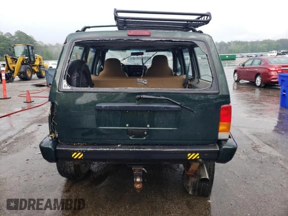 ✅ 1997 Jeep Cherokee SE • VIN: 1J4FJ28S5VL509588 • Lot: 56181695. Wystawiony na Copart z przebiegiem 313 430 mil. Bezpłatny archiwum sprzedaży aukcyjnych z USA i szczegółowy raport historii pojazdu na DreamBid. Zdjęcie 6.