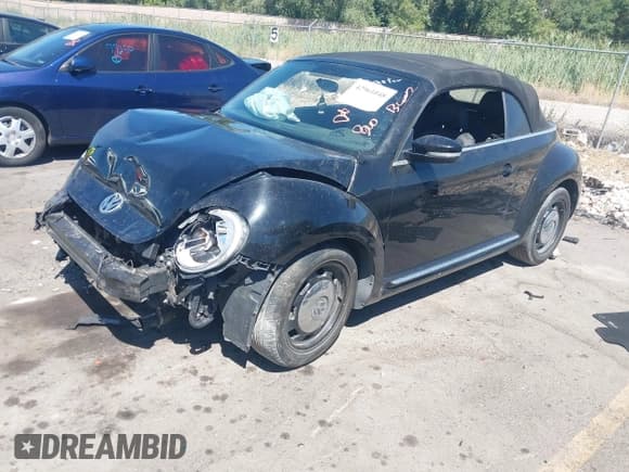 ✅ 2014 Volkswagen Beetle 1.8T • VIN: 3VW517AT6EM821755 • Лот: 42961048. Опубликован ранее на IAAI с пробегом 91 264 миль. Бесплатный доступ к архиву аукционных продаж из США и подробный отчёт об истории автомобиля на DreamBid. Изображение 2.