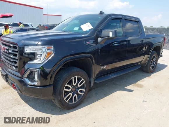 ✅ 2022 GMC Sierra 1500 AT4 • VIN: 3GTP9EEL3NG196281 • Лот: 43220572. Опубликован ранее на IAAI с пробегом 83 100 миль. Бесплатный доступ к архиву аукционных продаж из США и подробный отчёт об истории автомобиля на DreamBid. Изображение 2.