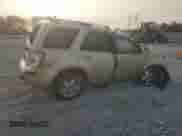 2010 Mercury Mariner Premier с VIN 4M2CN9HG4AKJ12675, выставлен на аукционе Copart как лот 71417445 с пробегом Не указан миль и Списание • Salvage title. История ставок и продаж доступна на DreamBid. Изображение 3.