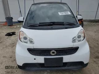 ✅ 2013 Smart fortwo Pure • VIN: WMEEJ3BA1DK695871 • Lot: 75319694. Wystawiony na Copart z przebiegiem 47 238 mil. Bezpłatny archiwum sprzedaży aukcyjnych z USA i szczegółowy raport historii pojazdu na DreamBid. Zdjęcie 5.