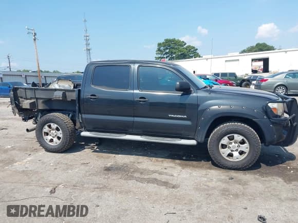 ✅ 2010 Toyota Tacoma PreRunner • VIN: 3TMJU4GN8AM101948 • Lot: 42655977. Listed on IAAI with 228,965 mi. Free auction sales archive from the USA and detailed vehicle history report at DreamBid. Image 13.