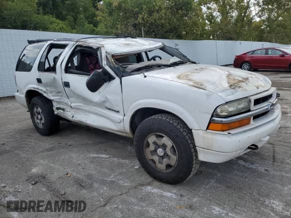 2004 Chevrolet Blazer LS z VIN 1GNDT13X84K162371, wystawiony jako Copart lot #71074684 z przebiegiem 273 070 mil mil oraz Szkoda całkowita • Salvage title. Historia ofert i sprzedaży dostępna na DreamBid. Obrazek 4.