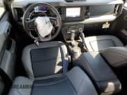 ✅ 2022 Ford Bronco • VIN: 1FMEE5BP6NLB14701 • Lot: 56496555. Listed on Copart with 23,881 mi. Free auction sales archive from the USA and detailed vehicle history report at DreamBid. Image 8.