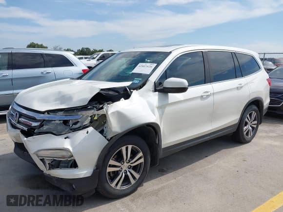 ✅ 2018 Honda Pilot EX-L • VIN: 5FNYF5H51JB000297 • Лот: 42807626. Опубликован ранее на IAAI с пробегом 103 380 миль. Бесплатный доступ к архиву аукционных продаж из США и подробный отчёт об истории автомобиля на DreamBid. Изображение 18.