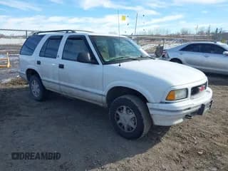 ✅ 1996 GMC Jimmy SL • VIN: 1GKDT13W8T2522192 • Lot: 41439548. Wystawiony na IAAI z przebiegiem 262 152 mil. Bezpłatny archiwum sprzedaży aukcyjnych z USA i szczegółowy raport historii pojazdu na DreamBid. Zdjęcie 1.