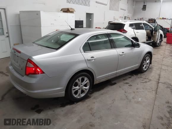 ✅ 2012 Ford Fusion SE • VIN: 3FAHP0HA3CR313100 • Lot: 43888027. Listed on IAAI with 206,717 mi. Free auction sales archive from the USA and detailed vehicle history report at DreamBid. Image 4.