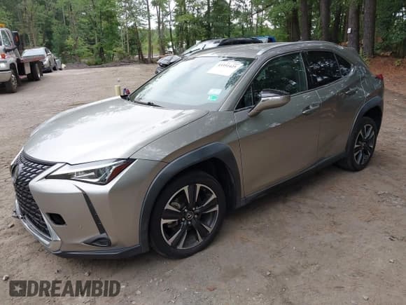 ✅ 2021 Lexus UX 200 • VIN: JTHX3JBH8M2036171 • Lot: 43351425. Listed on IAAI with 52,480 mi. Free auction sales archive from the USA and detailed vehicle history report at DreamBid. Image 2.