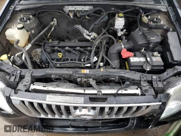 2011 Mercury Mariner z VIN 4M2CN8B7XBKJ06187, wystawiony jako Copart lot #81495034 z przebiegiem 162 349 mil mil oraz Czysty tytuł • Clean title. Historia ofert i sprzedaży dostępna na DreamBid. Obrazek 12.