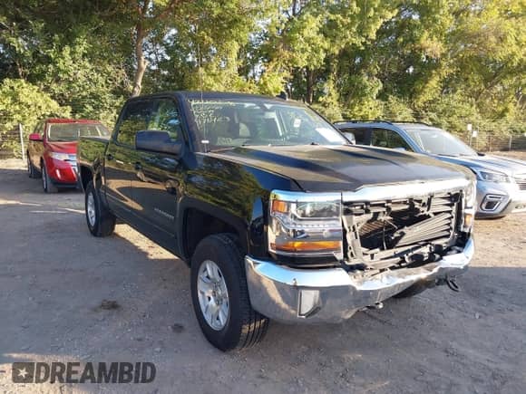 2018 Chevrolet Silverado 1500 LT z VIN 3GCUKREC5JG476423, wystawiony jako IAAI lot #43330536 z przebiegiem 178 133 mil mil oraz . Historia ofert i sprzedaży dostępna na DreamBid. Obrazek 1.