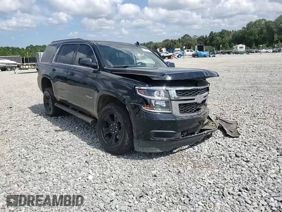 2019 Chevrolet Tahoe LS с VIN 1GNSCAEC1KR374535, выставлен на аукционе Copart как лот 81609295 с пробегом 100 726 миль миль и Списание • Salvage title. История ставок и продаж доступна на DreamBid. Изображение 14.