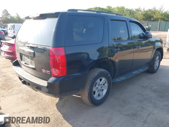 ✅ 2009 GMC Yukon • VIN: 1GKFC23049R189807 • Lot: 42464893. Listed on IAAI with Not provided. Free auction sales archive from the USA and detailed vehicle history report at DreamBid. Image 4.