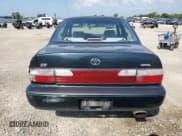 ✅ 1996 Toyota Corolla DX • VIN: 1NXBB02E8TZ387353 • Lot: 69556895. Listed on Copart with 187,677 mi. Free auction sales archive from the USA and detailed vehicle history report at DreamBid. Image 6.