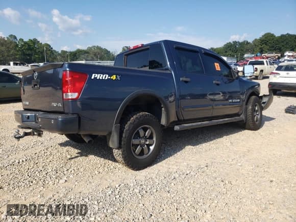 ✅ 2014 Nissan Titan Pro-4X • VIN: 1N6AA0EC3EN519605 • Lot: 69623895. Listed on Copart with 70,311 mi. Free auction sales archive from the USA and detailed vehicle history report at DreamBid. Image 3.