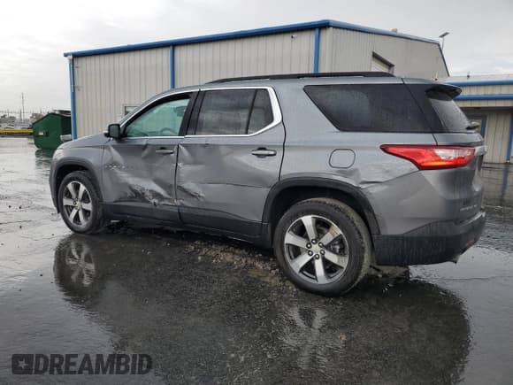 ✅ 2021 Chevrolet Traverse LT • VIN: 1GNEVHKW3MJ109521 • Lot: 81776725. Listed on Copart with 80,952 mi. Free auction sales archive from the USA and detailed vehicle history report at DreamBid. Image 2.