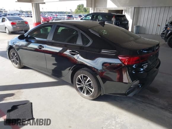 ✅ 2023 Kia Forte LXS • VIN: 3KPF24AD6PE650854 • Lot: 43671563. Listed on IAAI with 23,694 mi. Free auction sales archive from the USA and detailed vehicle history report at DreamBid. Image 3.