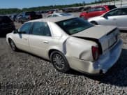 ✅ 2003 Cadillac DeVille DHS • VIN: 1G6KE54YX3U190879 • Lot: 57874555. Listed on Copart with 180,129 mi. Free auction sales archive from the USA and detailed vehicle history report at DreamBid. Image 2.