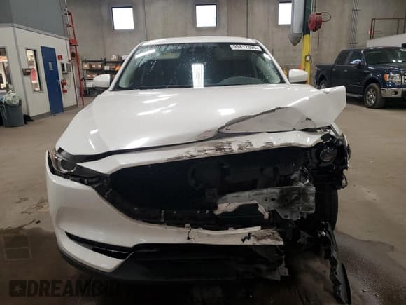 ✅ 2018 Mazda CX-5 Sport • VIN: JM3KFBBMXJ0335813 • Lot: 93412395. Wystawiony na Copart z przebiegiem 86 730 mil. Bezpłatny archiwum sprzedaży aukcyjnych z USA i szczegółowy raport historii pojazdu na DreamBid. Zdjęcie 5.