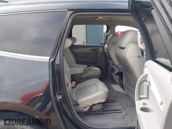 2015 Chevrolet Traverse LT z VIN 1GNKVHKDXFJ112775, wystawiony jako IAAI lot #43396691 z przebiegiem Nie podano mil oraz . Historia ofert i sprzedaży dostępna na DreamBid. Obrazek 8.