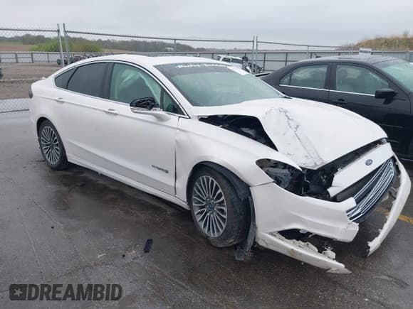 ✅ 2017 Ford Fusion Hybrid Titanium • VIN: 3FA6P0RUXHR317572 • Lot: 42170169. Listed on IAAI with 138,987 mi. Free auction sales archive from the USA and detailed vehicle history report at DreamBid. Image 1.