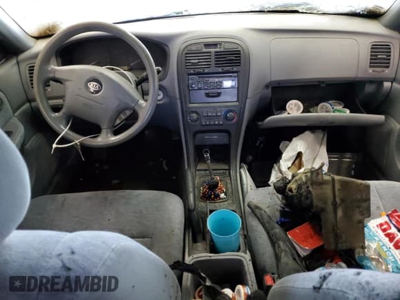 ✅ 2003 Kia Optima LX • VIN: KNAGD126335211255 • Лот: 60637665. Опубликован ранее на Copart с пробегом Не указан. Бесплатный доступ к архиву аукционных продаж из США и подробный отчёт об истории автомобиля на DreamBid. Изображение 8.