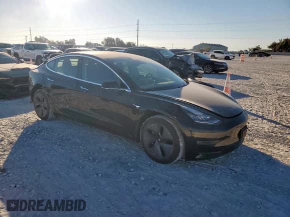 ✅ 2019 Tesla Model 3 Mid Range • VIN: 5YJ3E1EAXKF399834 • Lot: 86126125. Wystawiony na Copart z przebiegiem 54 504 mil. Bezpłatny archiwum sprzedaży aukcyjnych z USA i szczegółowy raport historii pojazdu na DreamBid. Zdjęcie 4.
