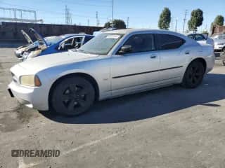 2009 Dodge Charger с VIN 2B3LA33V79H521018, выставлен на аукционе Copart как лот 80055914 с пробегом 183 023 миль миль и Чистый • Clean title. История ставок и продаж доступна на DreamBid. Изображение 1.