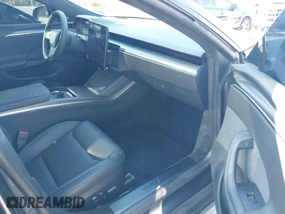 ✅ 2023 Tesla Model S Plaid • VIN: 5YJSA1E62PF530538 • Lot: 41553415. Listed on IAAI with 31,392 mi. Free auction sales archive from the USA and detailed vehicle history report at DreamBid. Image 5.