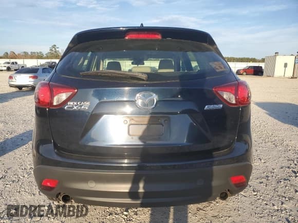 ✅ 2014 Mazda CX-5 Sport • VIN: JM3KE2BE5E0421774 • Lot: 92990745. Wystawiony na Copart z przebiegiem 259 399 mil. Bezpłatny archiwum sprzedaży aukcyjnych z USA i szczegółowy raport historii pojazdu na DreamBid. Zdjęcie 7.