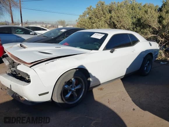 ✅ 2013 Dodge Challenger R/T • VIN: 2C3CDYBT2DH601018 • Lot: 41301532. Wystawiony na IAAI z przebiegiem 129 447 mil. Bezpłatny archiwum sprzedaży aukcyjnych z USA i szczegółowy raport historii pojazdu na DreamBid. Zdjęcie 2.