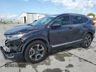 ✅ 2019 Honda CR-V Touring • VIN: 7FARW1H91KE006283 • Лот: 81767375. Опубликован ранее на Copart с пробегом 67 031 миль. Бесплатный доступ к архиву аукционных продаж из США и подробный отчёт об истории автомобиля на DreamBid. Изображение 1.