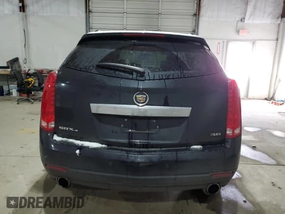 ✅ 2012 Cadillac SRX Premium Collection • VIN: 3GYFNFE31CS653641 • Lot: 38424094. Wystawiony na Copart z przebiegiem 100 677 mil. Bezpłatny archiwum sprzedaży aukcyjnych z USA i szczegółowy raport historii pojazdu na DreamBid. Zdjęcie 6.