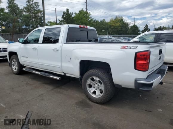 ✅ 2018 Chevrolet Silverado 1500 LT • VIN: 3GCUKREC6JG510207 • Лот: 67129864. Опубликован ранее на Copart с пробегом 107 876 миль. Бесплатный доступ к архиву аукционных продаж из США и подробный отчёт об истории автомобиля на DreamBid. Изображение 2.
