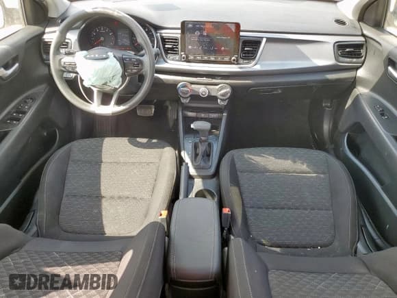 ✅ 2023 Kia Rio S • VIN: 3KPA24AD0PE568306 • Lot: 71277945. Listed on Copart with 17,509 mi. Free auction sales archive from the USA and detailed vehicle history report at DreamBid. Image 8.