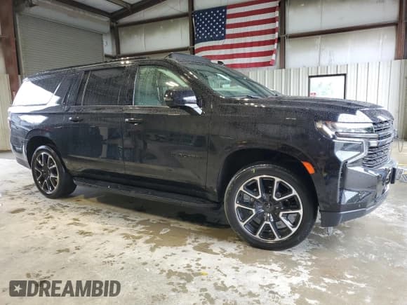 ✅ 2022 Chevrolet Suburban RST • VIN: 1GNSKEKD0NR339979 • Lot: 57858355. Listed on Copart with 20,359 mi. Free auction sales archive from the USA and detailed vehicle history report at DreamBid. Image 4.