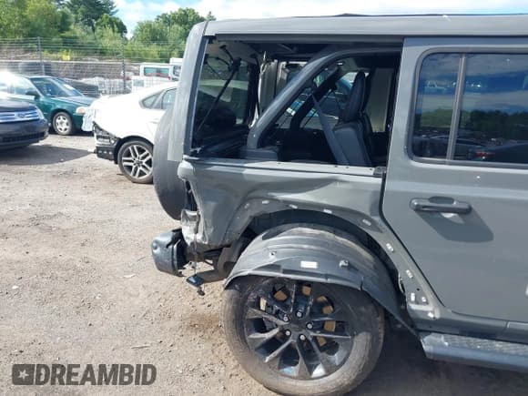 ✅ 2023 Jeep Wrangler Sahara • VIN: 1C4JJXP64PW568165 • Lot: 42740617. Listed on IAAI with 86,559 mi. Free auction sales archive from the USA and detailed vehicle history report at DreamBid. Image 12.