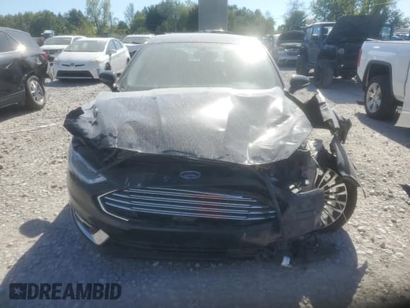 ✅ 2017 Ford Fusion Titanium • VIN: 3FA6P0D97HR251517 • Лот: 81607965. Опубликован ранее на Copart с пробегом 146 369 миль. Бесплатный доступ к архиву аукционных продаж из США и подробный отчёт об истории автомобиля на DreamBid. Изображение 5.