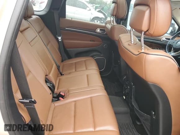 ✅ 2015 Jeep Grand Cherokee Summit • VIN: 1C4RJFJG1FC832070 • Lot: 71791905. Listed on Copart with 129,895 mi. Free auction sales archive from the USA and detailed vehicle history report at DreamBid. Image 11.