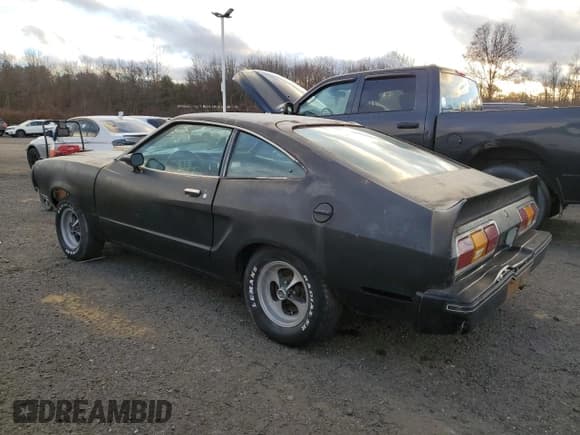 ✅ 1977 Ford Mustang • VIN: 7F03F189260 • Lot: 92283565. Listed on Copart with 66,337 mi. Free auction sales archive from the USA and detailed vehicle history report at DreamBid. Image 2.