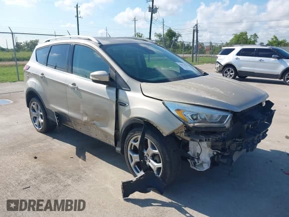 ✅ 2017 Ford Escape Titanium • VIN: 1FMCU0J99HUA03820 • Лот: 42974780. Опубликован ранее на IAAI с пробегом Не указан. Бесплатный доступ к архиву аукционных продаж из США и подробный отчёт об истории автомобиля на DreamBid. Изображение 1.