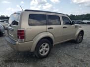 ✅ 2010 Dodge Nitro SXT • VIN: 1D4PU5GK4AW126581 • Lot: 64096425. Listed on Copart with 154,839 mi. Free auction sales archive from the USA and detailed vehicle history report at DreamBid. Image 3.