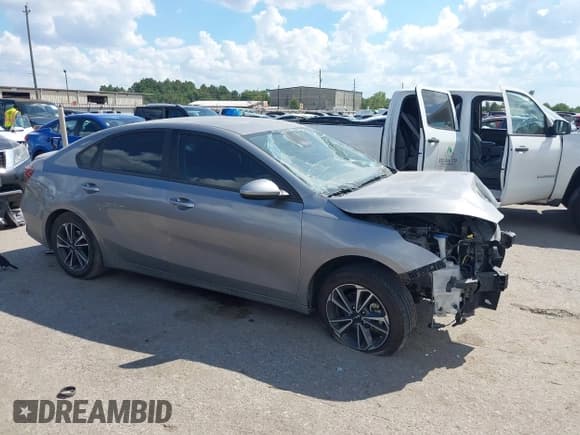 ✅ 2023 Kia Forte LXS • VIN: 3KPF24AD2PE606561 • Lot: 43400482. Listed on IAAI with 61,935 mi. Free auction sales archive from the USA and detailed vehicle history report at DreamBid. Image 14.