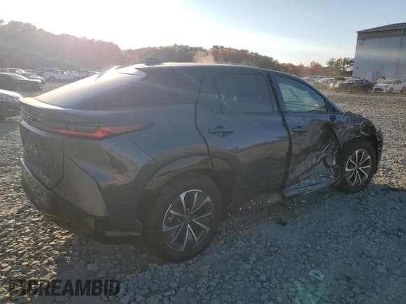 ✅ 2023 Lexus RZ 450e Premium • VIN: JTJAAAAB0PA020676 • Lot: 77093564. Wystawiony na Copart z przebiegiem 10 344 mil. Bezpłatny archiwum sprzedaży aukcyjnych z USA i szczegółowy raport historii pojazdu na DreamBid. Zdjęcie 3.