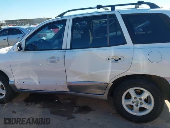 ✅ 2004 Hyundai Santa Fe GLS • VIN: KM8SC13E44U672070 • Lot: 43383997. Listed on IAAI with 219,150 mi. Free auction sales archive from the USA and detailed vehicle history report at DreamBid. Image 17.