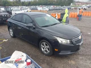 ✅ 2013 Chevrolet Cruze 1LT • VIN: 1G1PC5SBXD7109038 • Lot: 43413290. Listed on IAAI with 105,515 mi. Free auction sales archive from the USA and detailed vehicle history report at DreamBid. Image 1.