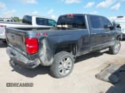 ✅ 2018 Chevrolet Silverado 2500HD High Country • VIN: 1GC1KXEY7JF109379 • Lot: 43361674. Listed on IAAI with 155,011 mi. Free auction sales archive from the USA and detailed vehicle history report at DreamBid. Image 4.