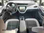 2020 Chevrolet Bolt EV LT z VIN 1G1FY6S04L4145115, wystawiony jako Copart lot #74961733 z przebiegiem 32 873 mil mil oraz . Historia ofert i sprzedaży dostępna na DreamBid. Obrazek 8.